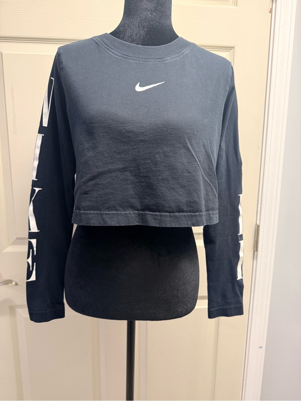 Nike Black Cropped Long-Sleeve Top with White Swoosh and Sleeve Script